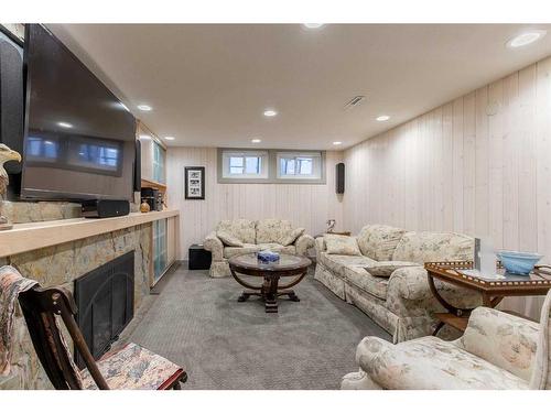 2825 Parkside Drive South, Lethbridge, AB - Indoor Photo Showing Basement With Fireplace