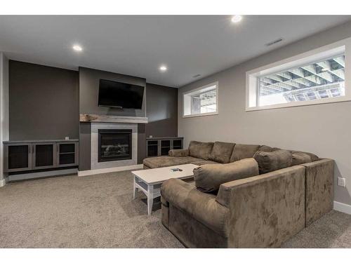 2510 Aspen Drive, Coaldale, AB - Indoor With Fireplace