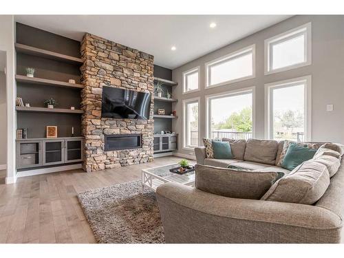 2510 Aspen Drive, Coaldale, AB - Indoor Photo Showing Living Room With Fireplace