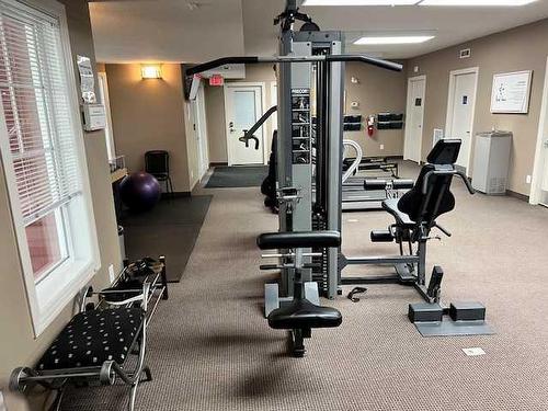 124-60 Royal Oak Plaza Nw, Calgary, AB - Indoor Photo Showing Gym Room