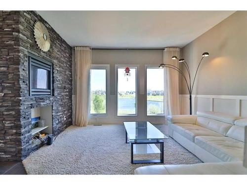 1569 Coalbanks Boulevard West, Lethbridge, AB - Indoor With Fireplace