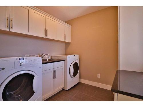 1569 Coalbanks Boulevard West, Lethbridge, AB - Indoor Photo Showing Laundry Room