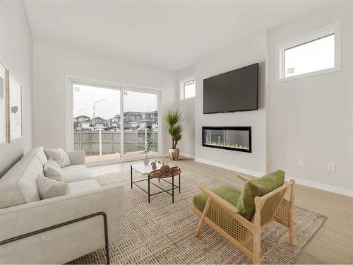 4602 26 Avenue South, Lethbridge, AB - Indoor Photo Showing Living Room With Fireplace