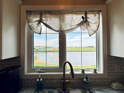 672 Parkside Green, Coaldale, AB - Indoor Photo Showing Kitchen With Double Sink