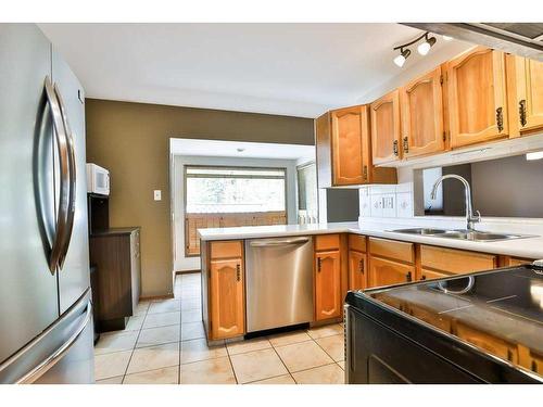 34 Tudor Court South, Lethbridge, AB - Indoor Photo Showing Kitchen With Stainless Steel Kitchen With Double Sink
