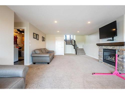 255 Canyon Estates Way West, Lethbridge, AB - Indoor Photo Showing Living Room With Fireplace