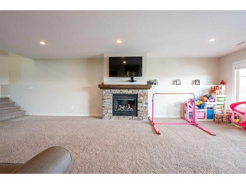 255 Canyon Estates Way West, Lethbridge, AB - Indoor With Fireplace