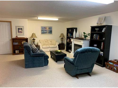 522 5 Street West, Cardston, AB - Indoor With Fireplace
