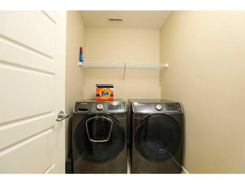 154 Lasalle Terrace West, Lethbridge, AB - Indoor Photo Showing Laundry Room