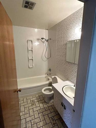 933 Macleod Street, Pincher Creek, AB - Indoor Photo Showing Bathroom
