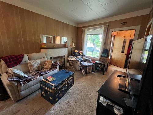 413 12C Street North, Lethbridge, AB - Indoor Photo Showing Living Room With Fireplace