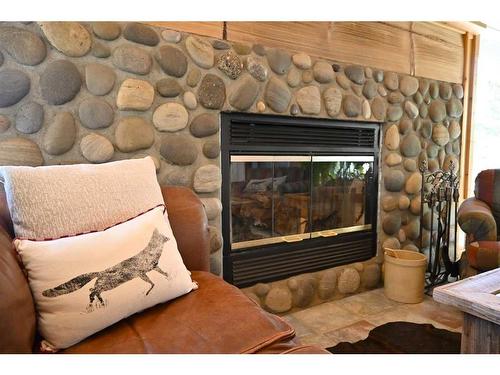 8416 Rge Rd 1-3, Rural Pincher Creek No. 9, M.D. Of, AB - Indoor Photo Showing Living Room With Fireplace