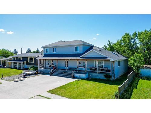 90 W 300 N, Raymond, AB - Outdoor With Deck Patio Veranda With Facade