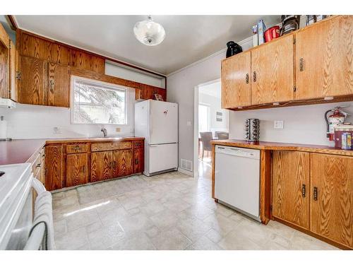 859 Kettles Street, Pincher Creek, AB - Indoor Photo Showing Kitchen With Double Sink