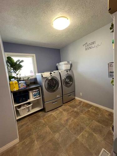 224 8 Street West, Cardston, AB - Indoor Photo Showing Laundry Room