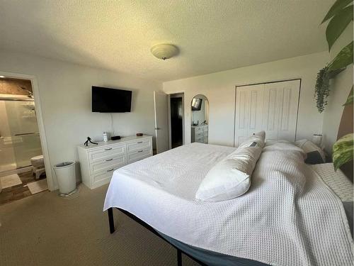 224 8 Street West, Cardston, AB - Indoor Photo Showing Bedroom