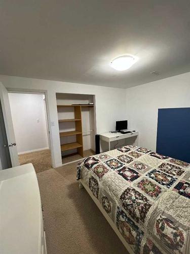 224 8 Street West, Cardston, AB - Indoor Photo Showing Bedroom