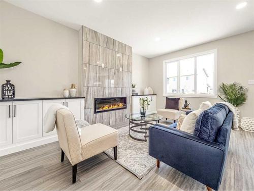 30 Northlander Lane West, Lethbridge, AB - Indoor Photo Showing Living Room With Fireplace