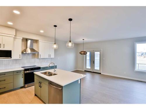 521 Malahat Green West, Lethbridge, AB - Indoor Photo Showing Kitchen With Stainless Steel Kitchen With Double Sink With Upgraded Kitchen