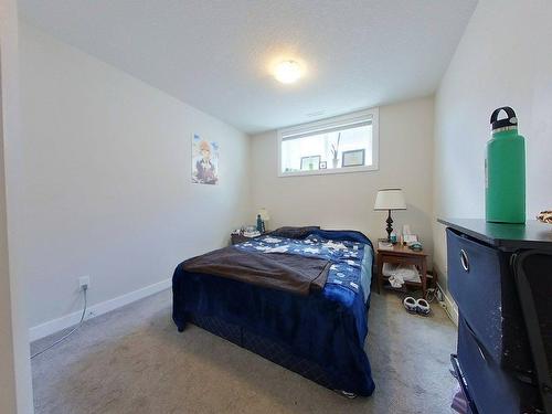 450 Mt Sundance Landing West, Lethbridge, AB - Indoor Photo Showing Bedroom