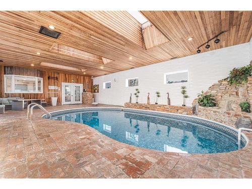 52 Lafayette Boulevard West, Lethbridge, AB - Indoor Photo Showing Other Room With In Ground Pool