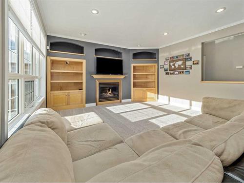 24 Fairmont Point South, Lethbridge, AB - Indoor Photo Showing Living Room With Fireplace