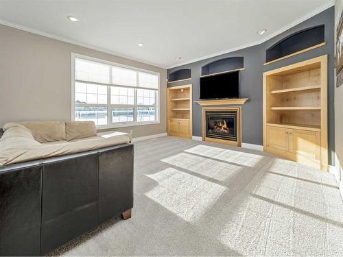 24 Fairmont Point South, Lethbridge, AB - Indoor Photo Showing Living Room With Fireplace