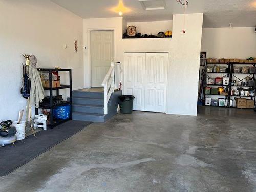 422 West Creek Drive, Cardston, AB - Indoor Photo Showing Garage