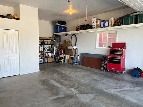 422 West Creek Drive, Cardston, AB - Indoor Photo Showing Garage
