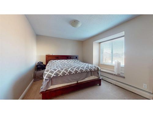103-4210 20 Avenue South, Lethbridge, AB - Indoor Photo Showing Bedroom