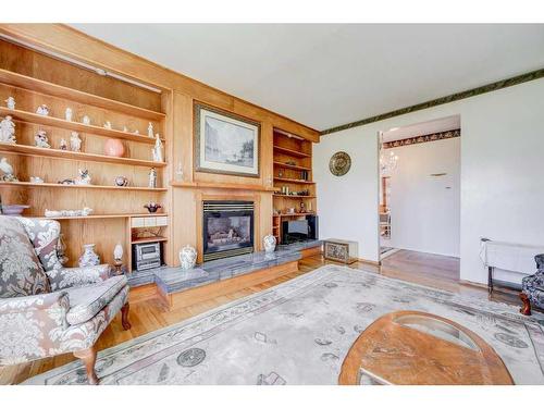 208 Railway Street Se, Milk River, AB - Indoor Photo Showing Living Room With Fireplace