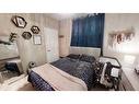 1112 Keystone Road West, Lethbridge, AB  - Indoor Photo Showing Bedroom 
