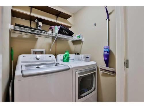 61-49 Keystone Terrace West, Lethbridge, AB - Indoor Photo Showing Laundry Room