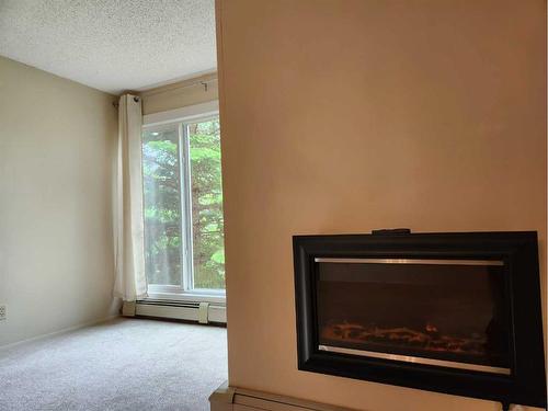 212-75 Temple Boulevard West, Lethbridge, AB - Indoor With Fireplace