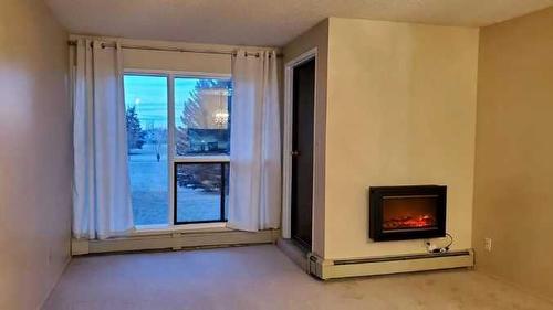 212-75 Temple Boulevard West, Lethbridge, AB - Indoor With Fireplace