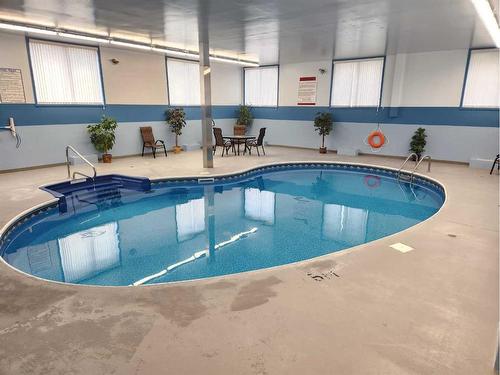 212-75 Temple Boulevard West, Lethbridge, AB - Indoor Photo Showing Other Room With In Ground Pool