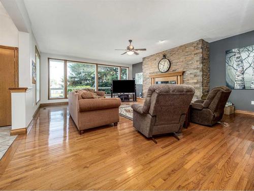 214 21 Street, Fort Macleod, AB - Indoor Photo Showing Living Room With Fireplace