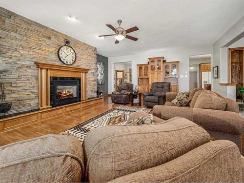 214 21 Street, Fort Macleod, AB - Indoor Photo Showing Living Room With Fireplace