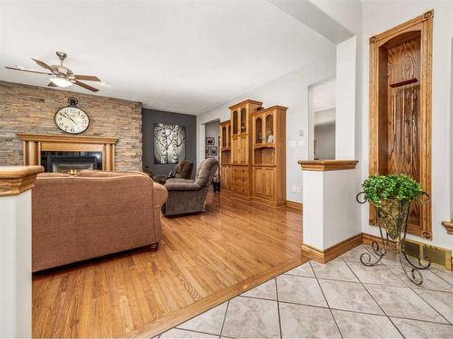 214 21 Street, Fort Macleod, AB - Indoor Photo Showing Other Room With Fireplace