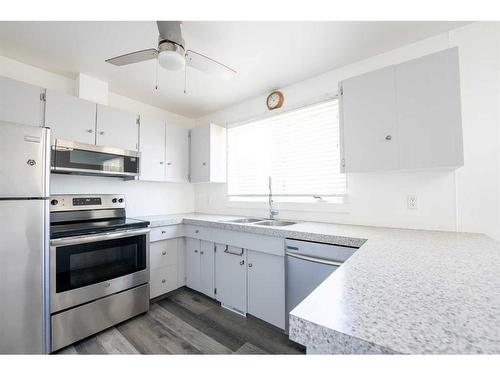 1215 23 Street North, Lethbridge, AB - Indoor Photo Showing Kitchen With Stainless Steel Kitchen With Double Sink