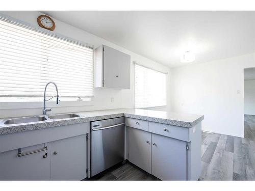 1215 23 Street North, Lethbridge, AB - Indoor Photo Showing Kitchen With Double Sink