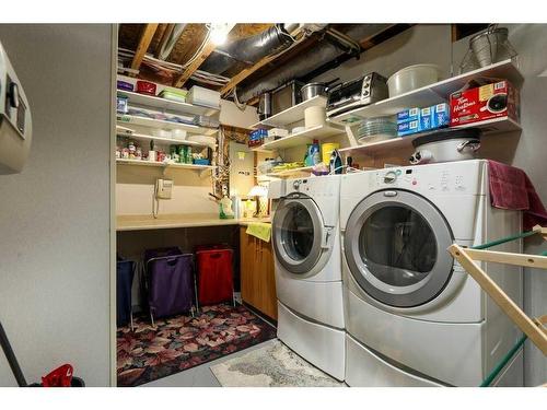 128 Heritage Point West, Lethbridge, AB - Indoor Photo Showing Laundry Room