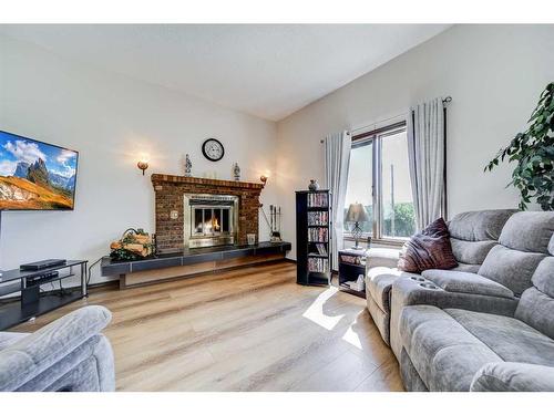 626 1 Avenue, Beaver Mines, AB - Indoor Photo Showing Living Room With Fireplace