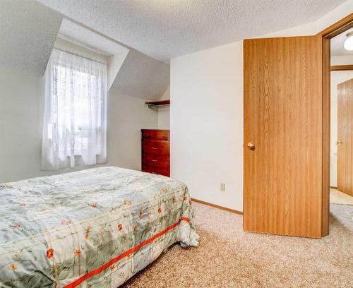 650 Schofield Street, Pincher Creek, AB - Indoor Photo Showing Bedroom