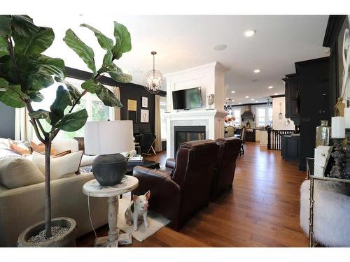 972 12 Street South, Lethbridge, AB - Indoor Photo Showing Living Room With Fireplace