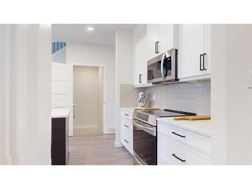 253 Rivergrove Chase West, Lethbridge, AB - Indoor Photo Showing Kitchen