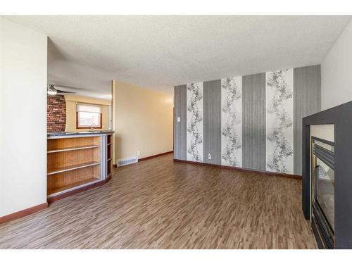 1714 14 Avenue North, Lethbridge, AB - Indoor With Fireplace