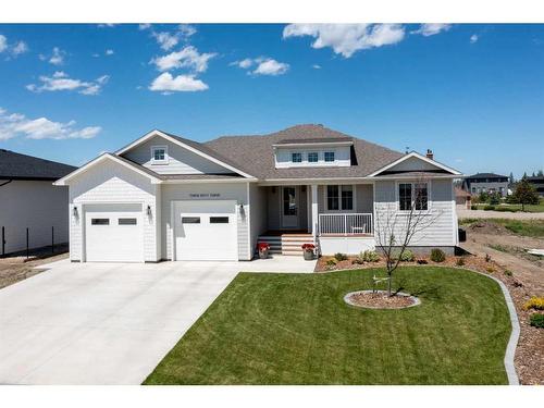 363 Church Avenue, Raymond, AB - Outdoor With Facade