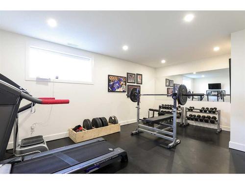 363 Church Avenue, Raymond, AB - Indoor Photo Showing Gym Room