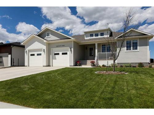 363 Church Avenue, Raymond, AB - Outdoor With Facade